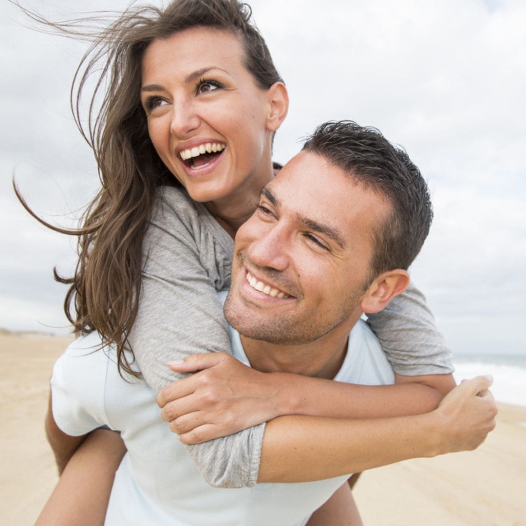 happy couple at the beach