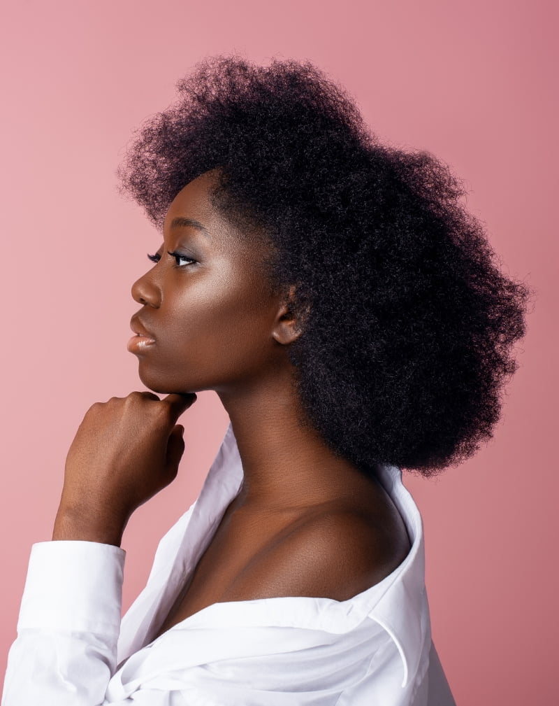 black woman with pink background